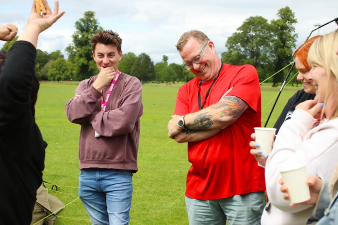 David and Stuart, from SAMH, laugh on the sidelines