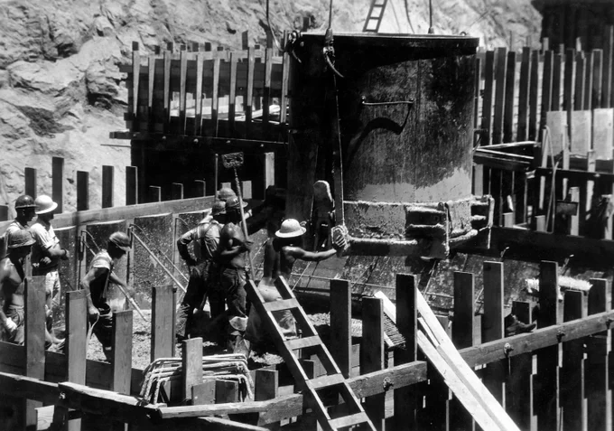 Photograph from Volume Two of a series of photo albums documenting the construction of Hoover Dam, Boulder City, Nevada. NARA's Rocky Mountain Region (Denver) (NRGA), Building 48, Denver Federal Center, West 6th Avenue and Kipling Street, Denver, CO, 80225-0307.
https://www.atlasofplaces.com/architecture/hoover-dam/ 14.8.20
INFO
https://commons.wikimedia.org/wiki/File:Placing_concrete_in_panel_forms_near_downstream_toe_in_Boulder_Dam_foundation._An_8-cubic_yard_bottom-dump_bucket..._-_NARA_-_293903.jpg
