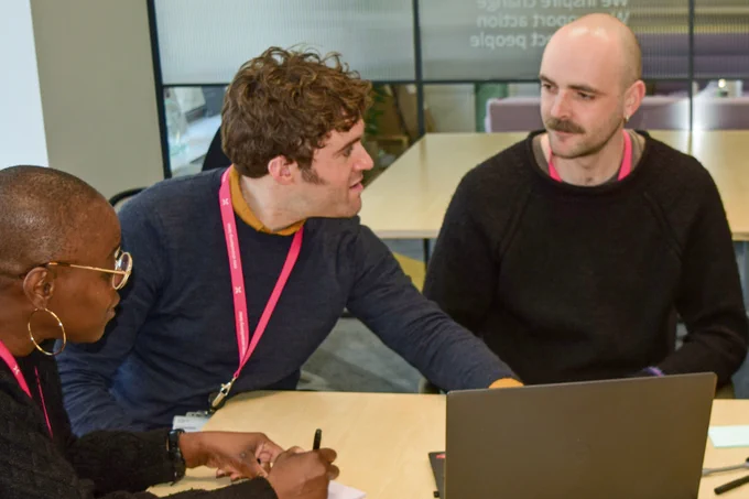 Three Connected Voice staff members having a meeting at One Strawberry Lane
