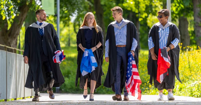 University of Stirling athletes Scott Meenagh, Louise Duncan, Tristen Bell and Gabriella Wood walk on campus.