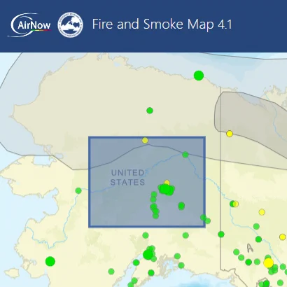 A screenshot of a smoke outlook in Alaska on AirNow's Fire and Smoke Map at approximately noon EST on June 27, 2025. The blue box is the smoke outlook and within its bounds, monitors display codes green and yellow.