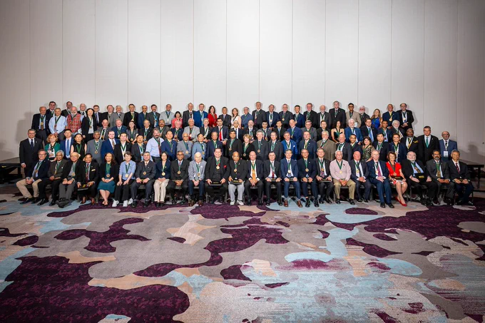 The newest Class of N.A.I. Fellows smiling and wearing their medals.
