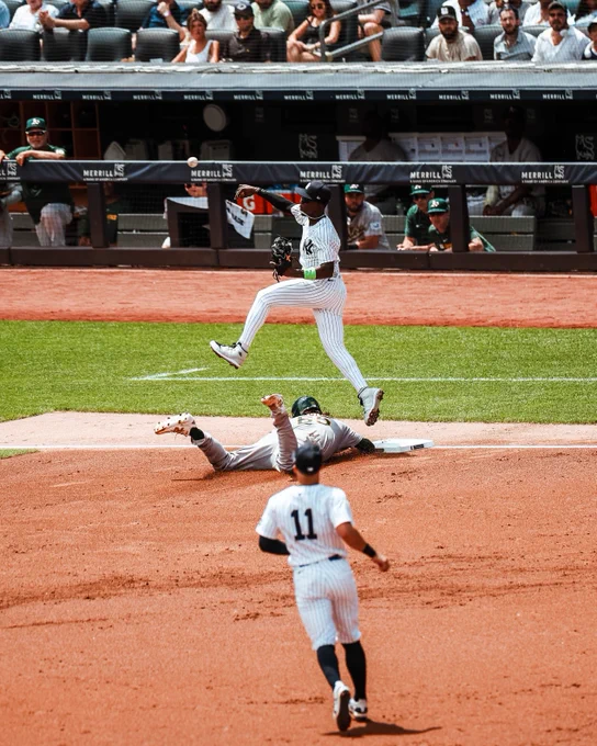 Jazz Chisholm Jr. turns a double play. 