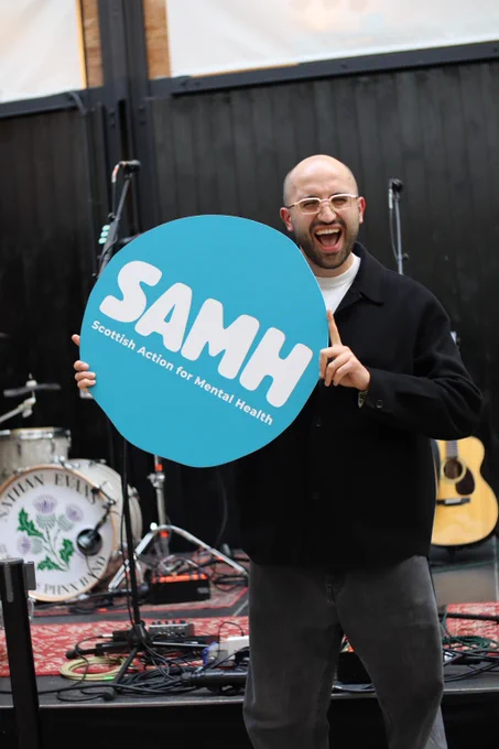 Fat Brestovci, our host, holding the SAMH logo
