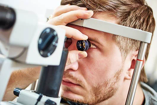 Close up person having an eye examination