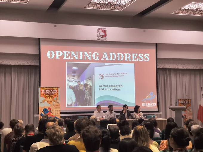 Opening Address in the Aula Magna at the Valletta Campus of the University of Malta, with Ashley Guajardo the DIGRA president. 