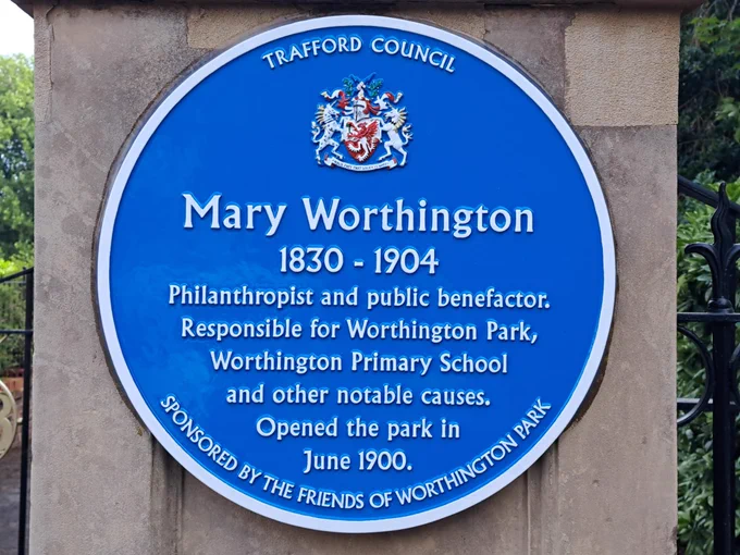 Blue plaque for Mary Worthington. Reads Trafford Council. Mary Worthington. 1830-1904. Philanthropist and public benefactor. Responsible for Worthington Park, Worthington Primary School and other notable causes. Opened the park in June 1900. Sponsored by the friends of Worthington Park.