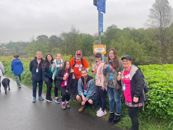 Only three miles to go, as the team take a group photo.