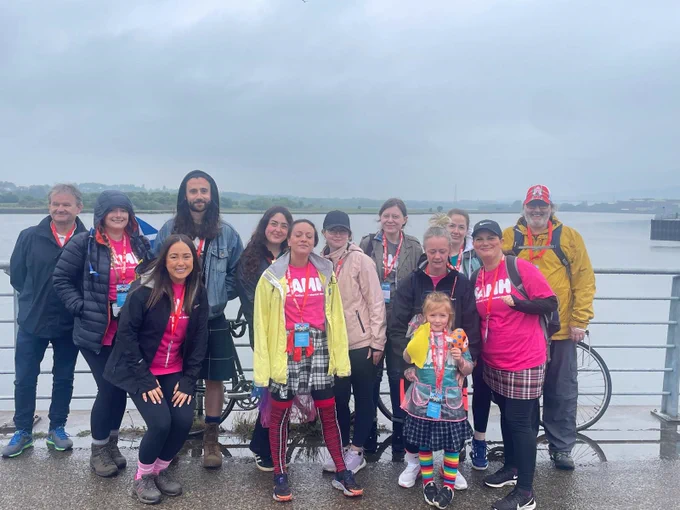 A (wet) Way Forward team keep their spirits high during the walk!