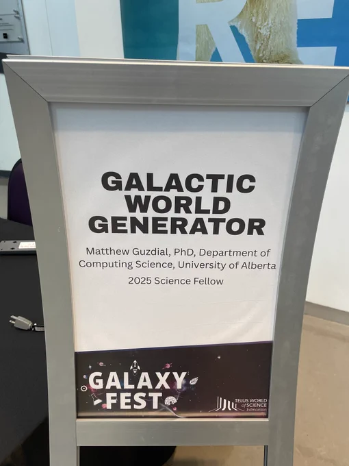 Sign reading "Galactic World Generator" and "Matthew Guzdial, PhD, Department of Computing Science, University of Alberta", and "2025 Science Fellow"