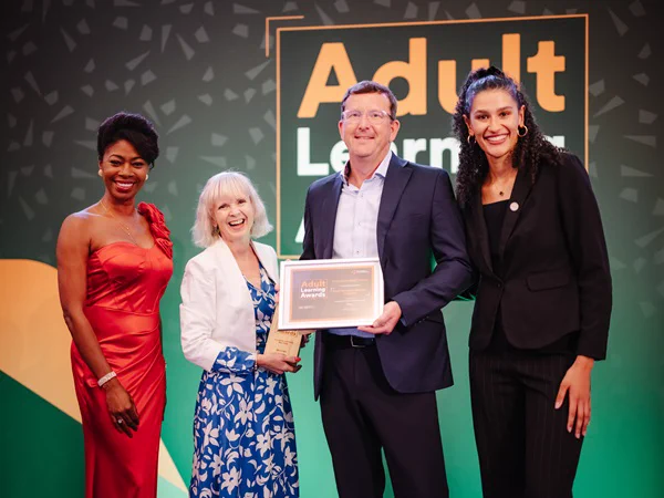 Adult Education staff at Coventry City Council collecting their award