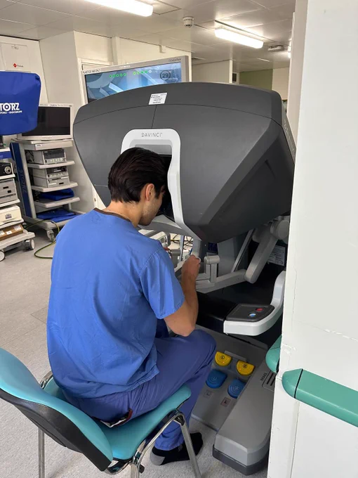 A photo of trainee surgeons at the event with the robotic technology.