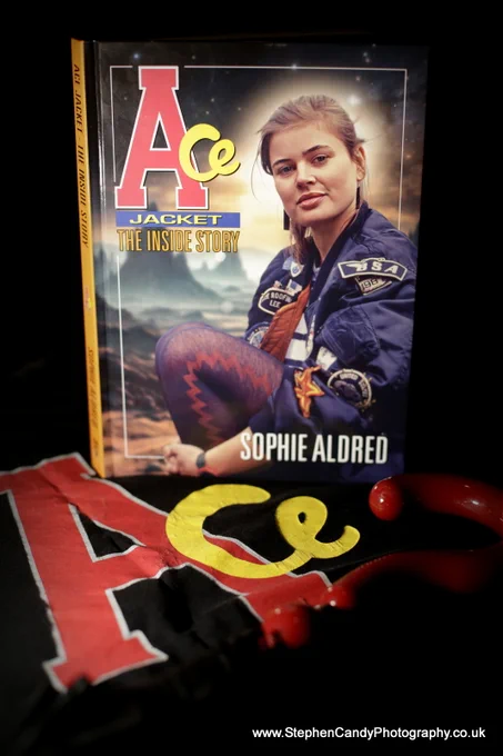 "Ace Jacket" book from Chinbeard Books, on the Ace logo as seen on the character's bomber jacket, and next to the Seventh Doctor's question mark umbrella.