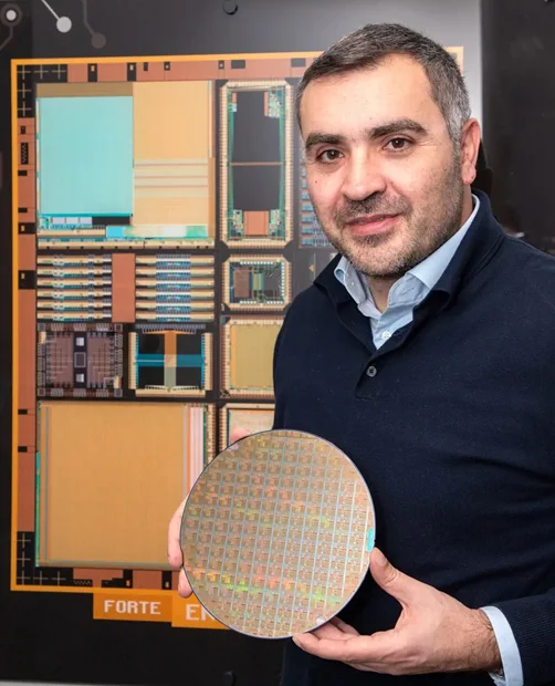 Picture of Professor Themis Prodromakis with Prodromakis' group design memristor devices that work with conventional CMOS processes