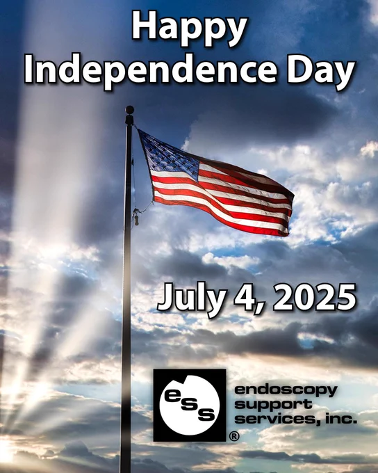 Happy Independence Day with U.S. Flag against a blue sky with clouds, setting sun with heavenly sunbeams.