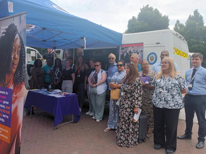 Representatives from community safety partnership agencies at a drop in public event in Birmingham during Antisocial Behaviour Awareness Week. 