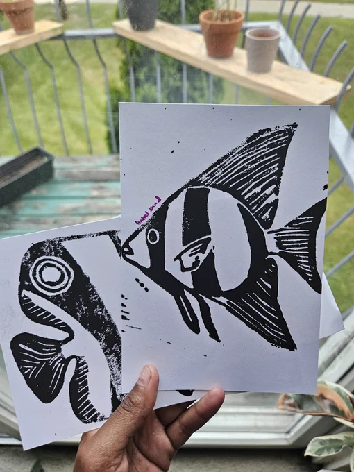 Linocut prints of spadefish and butterfly fish