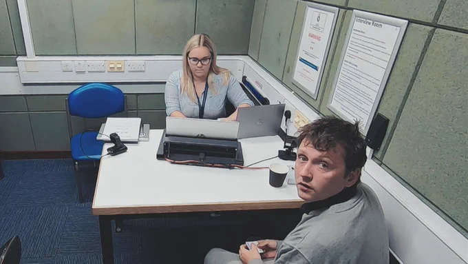 Craig France is sat in an interview suite being interviewed by a female police officer