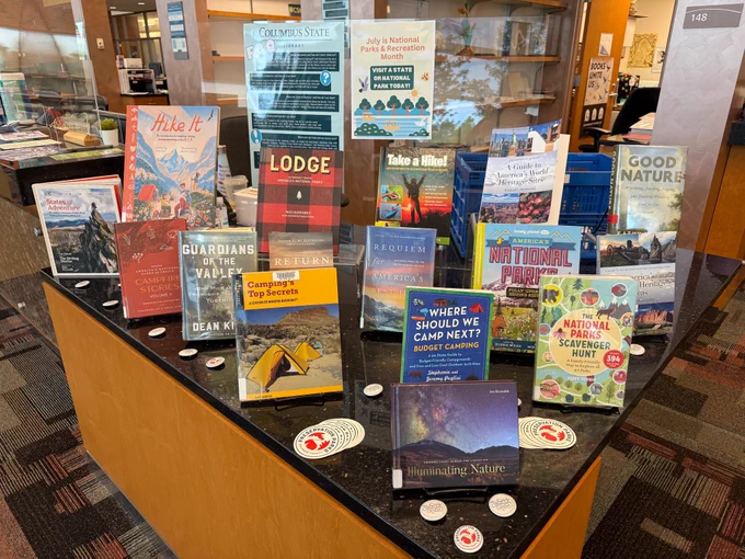 Tabletop book display with books about parks and recreation.