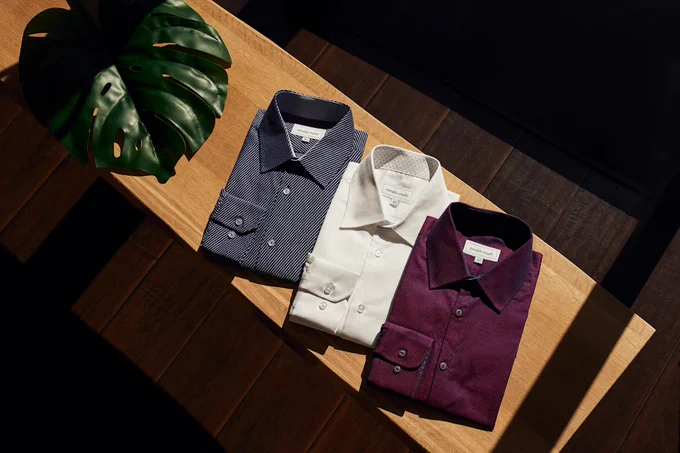 Three stylish dress shirts on display.