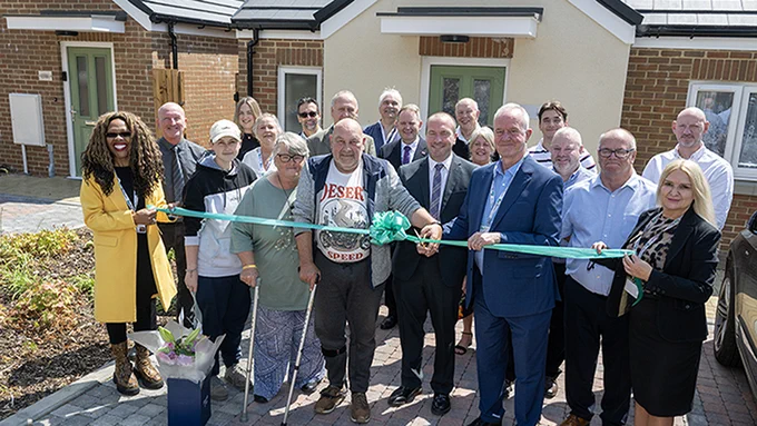 Ribbon cutting at completion ceremony for the launch of eight new affordable homes to rent, in Kettering.