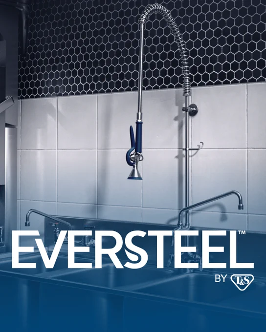 Advertisement for EVERSTEEL by T&S featuring a sleek, stainless steel industrial kitchen faucet over a deep sink, set against a dark tile backsplash.