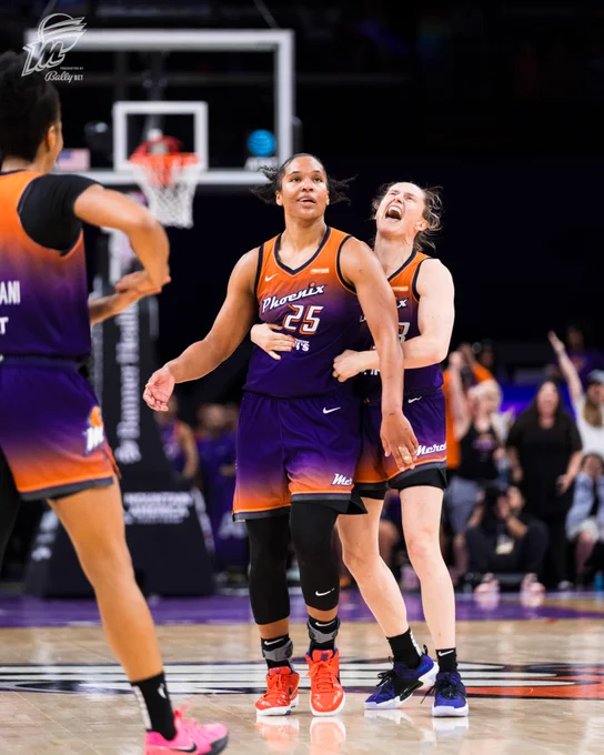 Photo of Sami and Alyssa Thomas celebrating