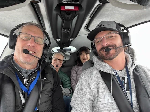 Roger (left rear seat) is able to travel from VT to MSK Cancer Center in NY  with his wife Heather by his side to receive treatment and care for a rare form of throat cancer. Flights like Roger's are made possible by our amazing volunteer pilots – like Todd F. (left front seat) and his mission assistant Scott N, and support from Alexion Charitable Foundation.