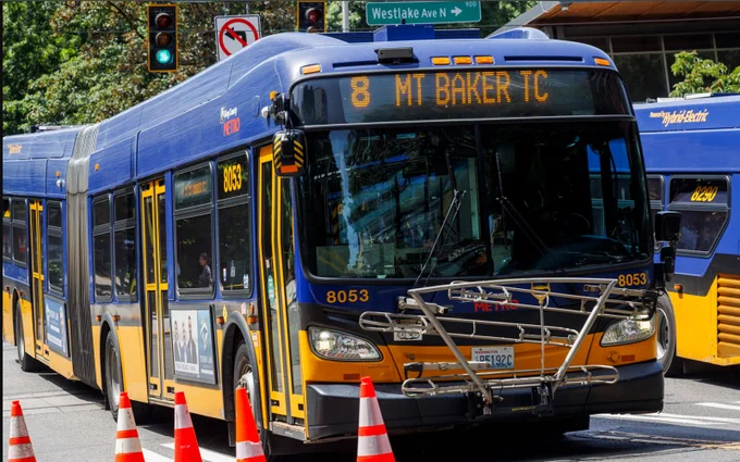 Image of Route 8 bus stuck in traffic near Westlake