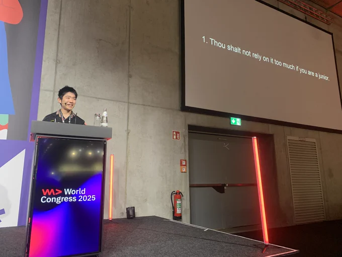 YK doing a talk at we are developers