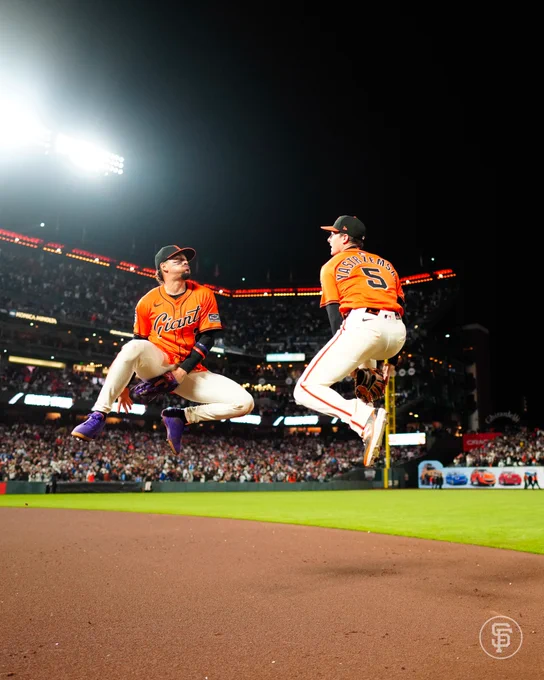 Adames and Yastrzemski celebrating the win