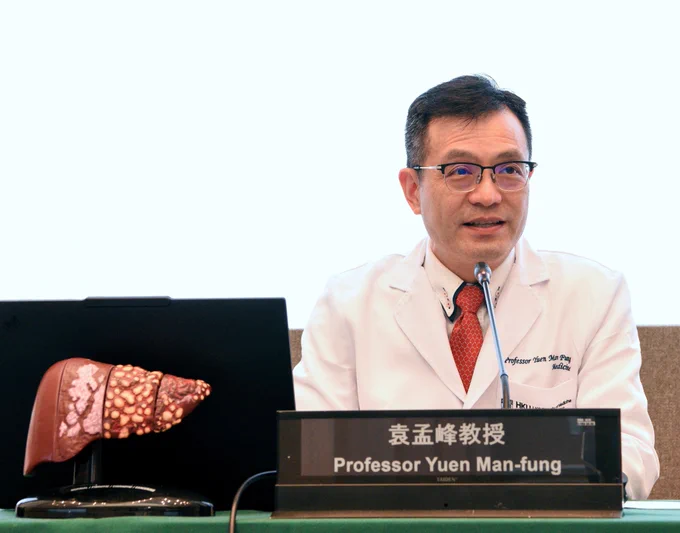 Professor Yuen Man-fung during the press conference