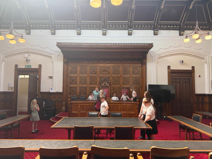 Rivington Primary School's school debate team in Council Chamber