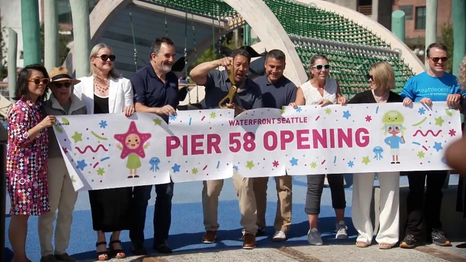 Mayor Bruce Harrell cuts a Pier 58 opening