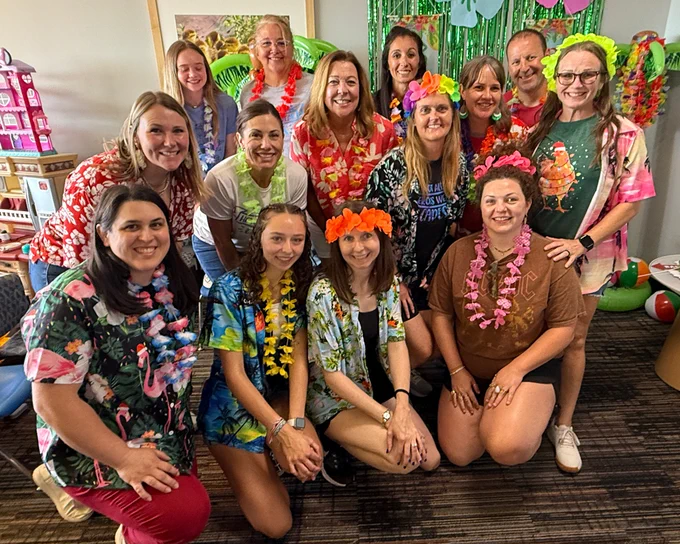 Group of volunteers with Little Moments Big Dreams Celebrations at Wesley Children's Hospital's Christmas in July event.
