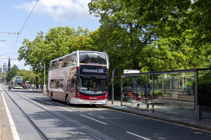 A Service 26 bus on a sunny Princes Street.