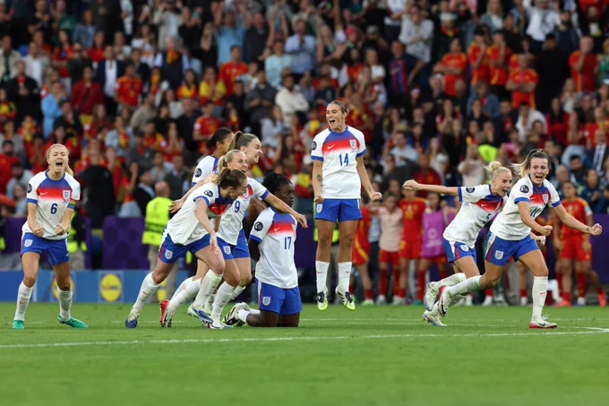 England players run to celebrate