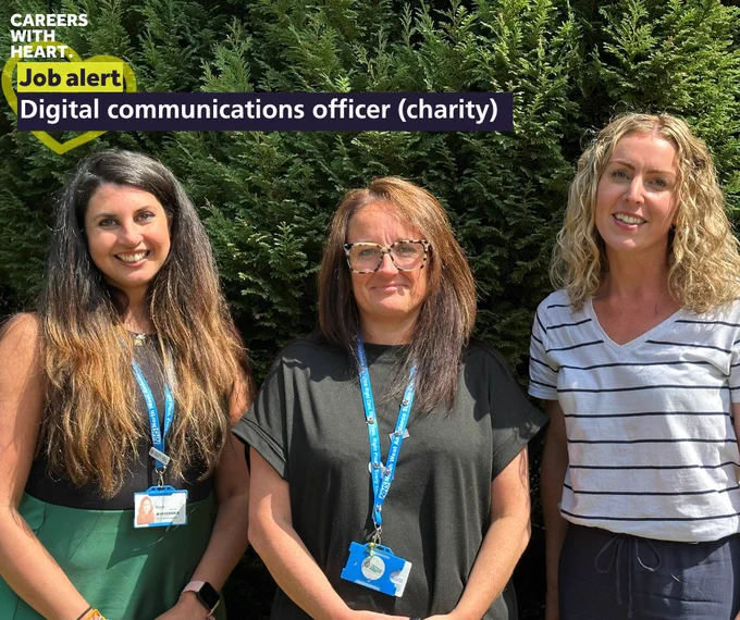 Three people wearing ID badges, standing in front of a green bush. Text overlay reads 'Careers with Heart. Job alert: Digital communications officer (charity).'