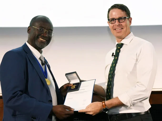 Todd Humphreys receiving Royal Institute of Navigation gold medal