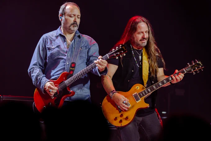 Close-up of Blackberry Smoke playing guitars on the Ryman stage