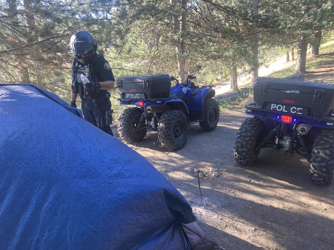 Handing out water on the trail.
