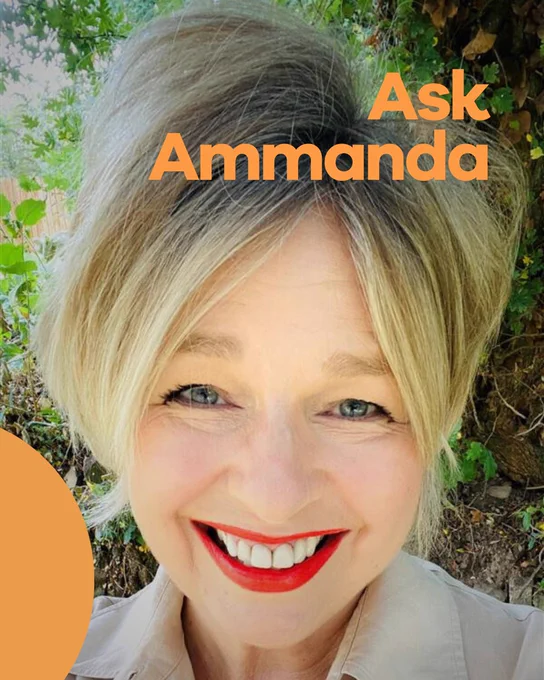 Promotional image for "Ask Ammanda" featuring a smiling person with short blonde hair, standing outdoors. The text "Ask Ammanda" is displayed in orange at the top.