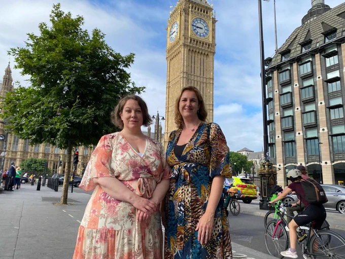 Dr Sarah Forbes and Dr Holly Birkett in front of the Queen Elizabeth Tower (Big Ben).