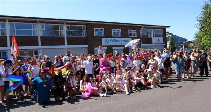 Group photo of St Helens Pride at Willowbrook Hospice