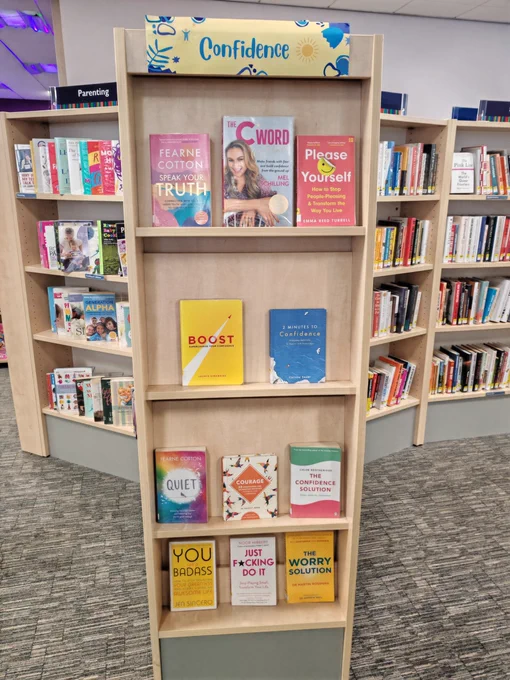 Here is a non-fiction book display organised under a banner that reads "Confidence".