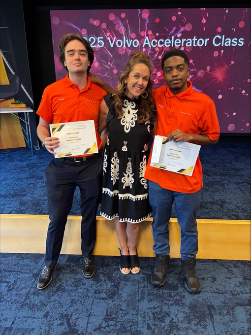 Dr. Emily Duplantis, CTE Assistant Director, with ARHS students who graduated from the Volvo Accelerator Program: Brian Yates and Ruari Collins.