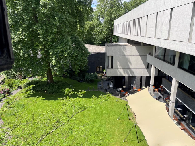 A side view of the RCP building and garden in the summer sun.