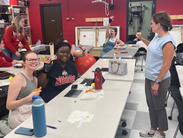 Sophie, Shirleen, Danielle, and Olivia (second year OT students) along with Dr. Jennifer Baker having fun while learning and making splints.