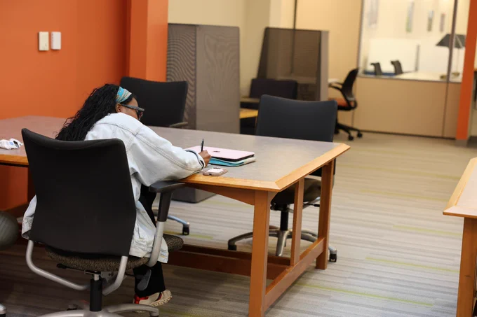 student working in Dana Health Sciences Library