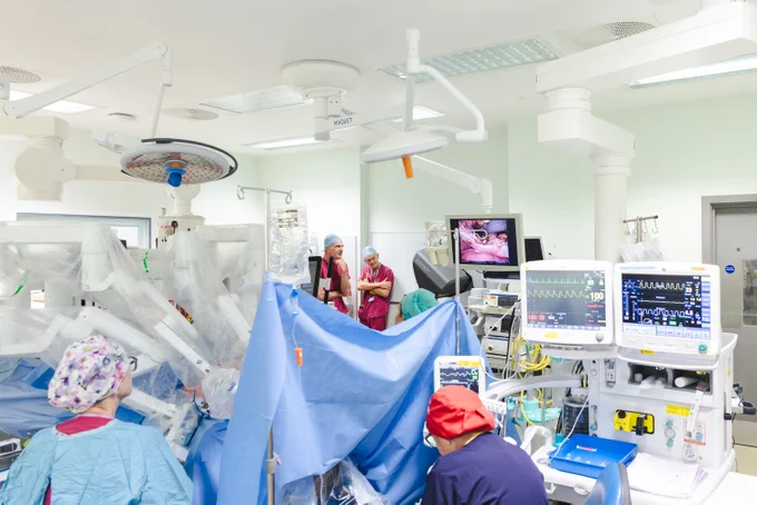 Surgery using robotic arms